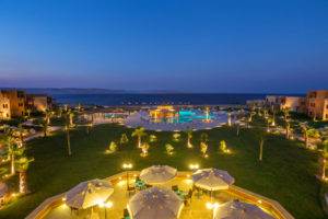 night overview of byoum lakeside in fayoum with a view pf hotel pools and lake